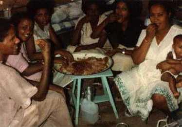 Eritrea woman, sharing the food