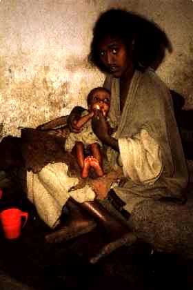 ethiopian-woman.jpg (13.130 bytes) Picture of Tigray woman with child in famine threatened Ethiopia