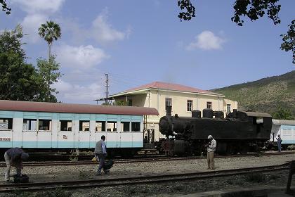 Antique locomotive and railcars at the Ghinda railway station.
