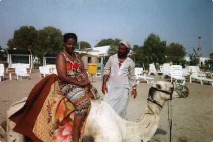 Riding a camel at Gurgussum Beach Hotel 