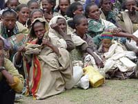tigray-ethiopia.jpg (9.452 bytes) Women and children waiting for food rations in famine threatened Tigray province of Ethiopia.